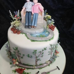retired couple gardening two tier cake