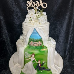 back of the cake with love at the top golf wedding cake