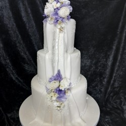 front lilac flowers wedding cake